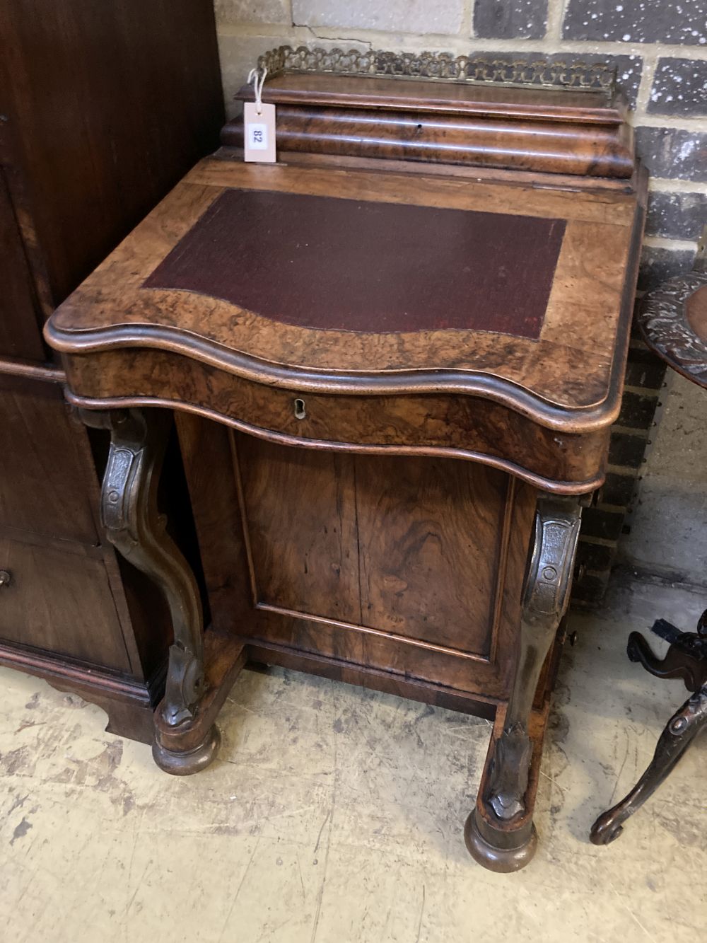 A Victorian walnut serpentine front davenport, width 54cm depth 54cm height 88cm